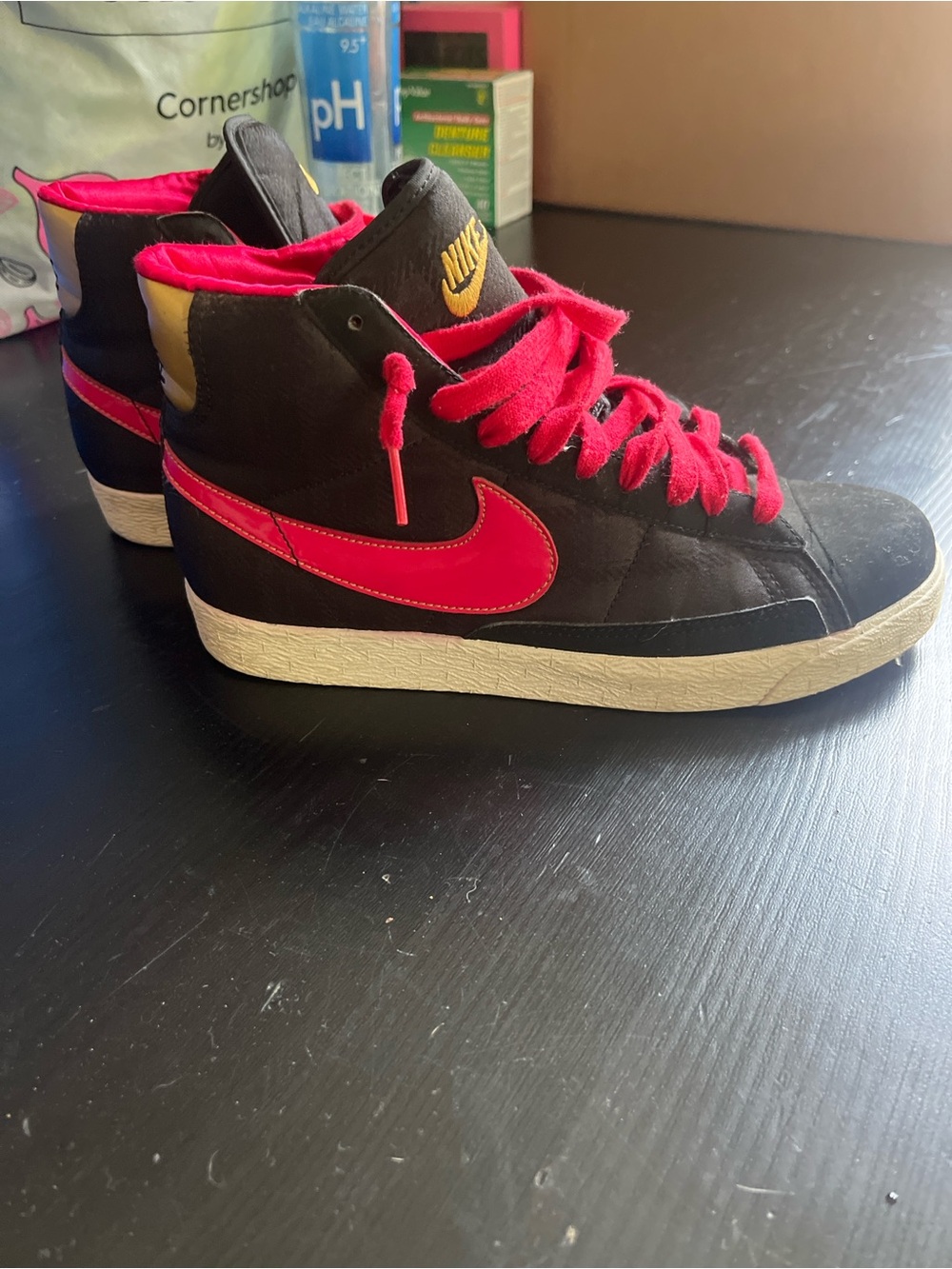 Nike Black High-Top Sneakers with Pink Swoosh and Laces
